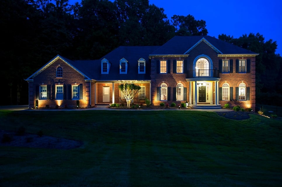 home additions contractor results at dusk with outdoor lighting in clifton, virginia