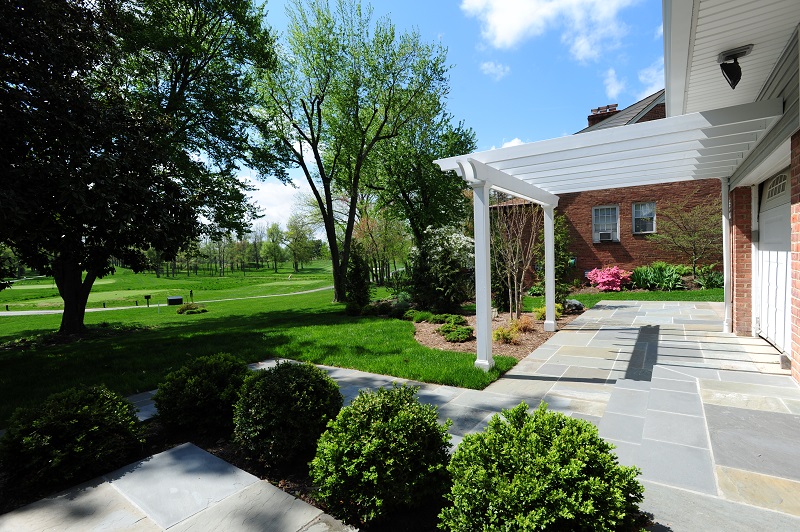 elevated flagstone patio with white trim in Rockville, Maryland elevated flagstone patio with white trim in Rockville, Maryland