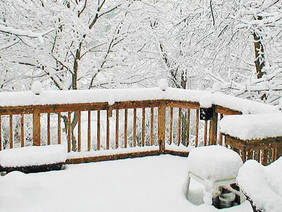 snow-covered deck with a wintry disposition