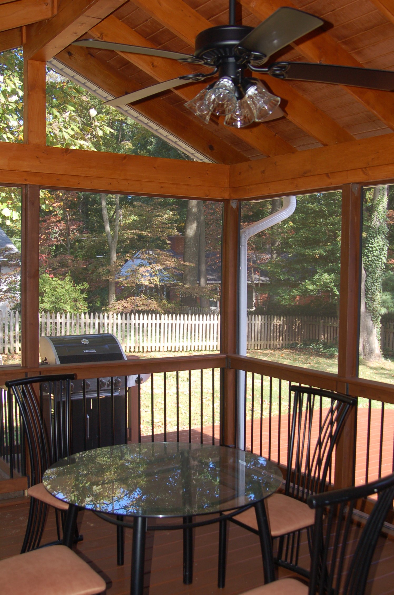 natural stained wood porch and screened room MD interior
