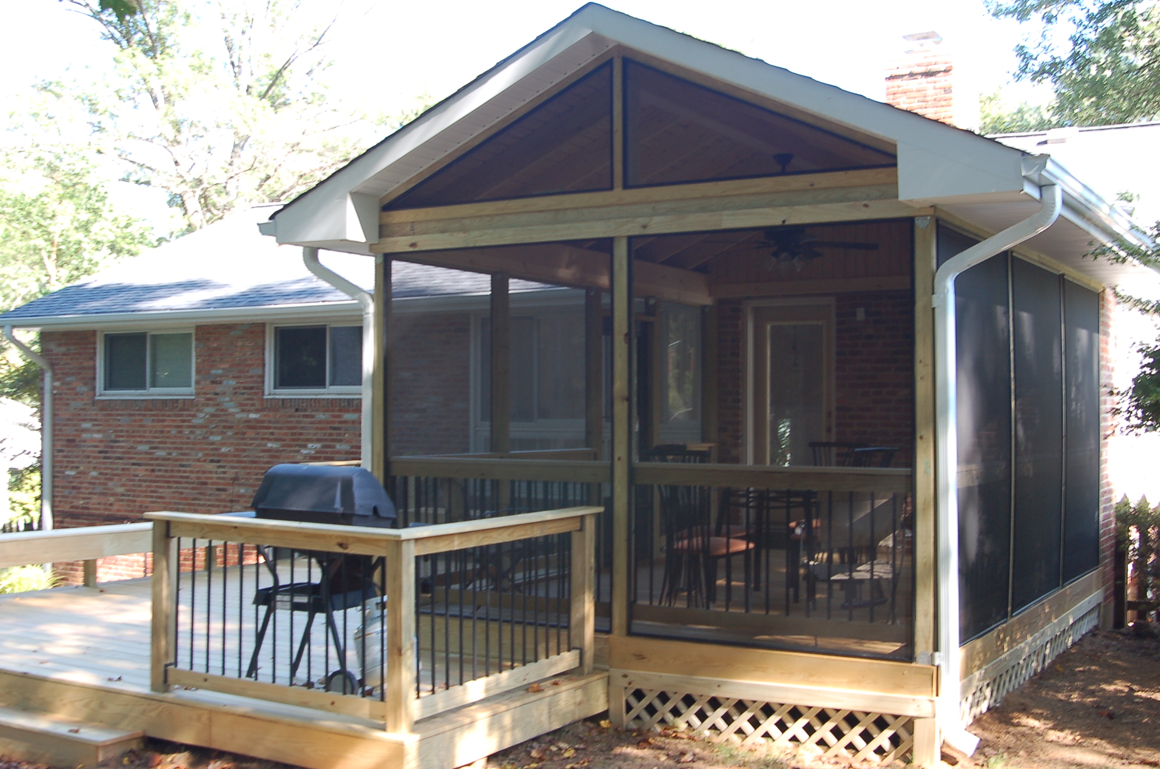 unstained hardwood screened porch