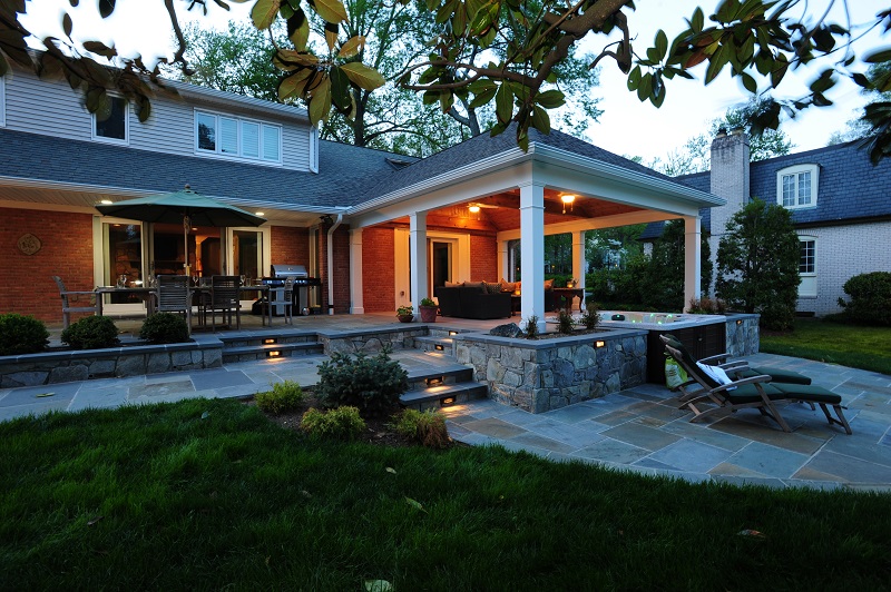 flagstone patio at night with night lighting