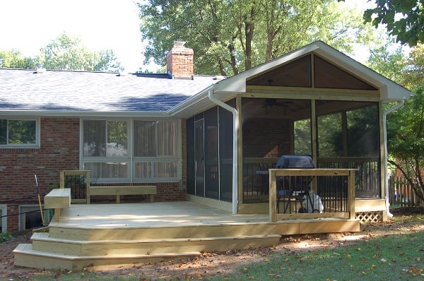 unstained pressure-treated deck screened porch