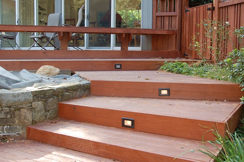 pressure-treated pool deck with lighting