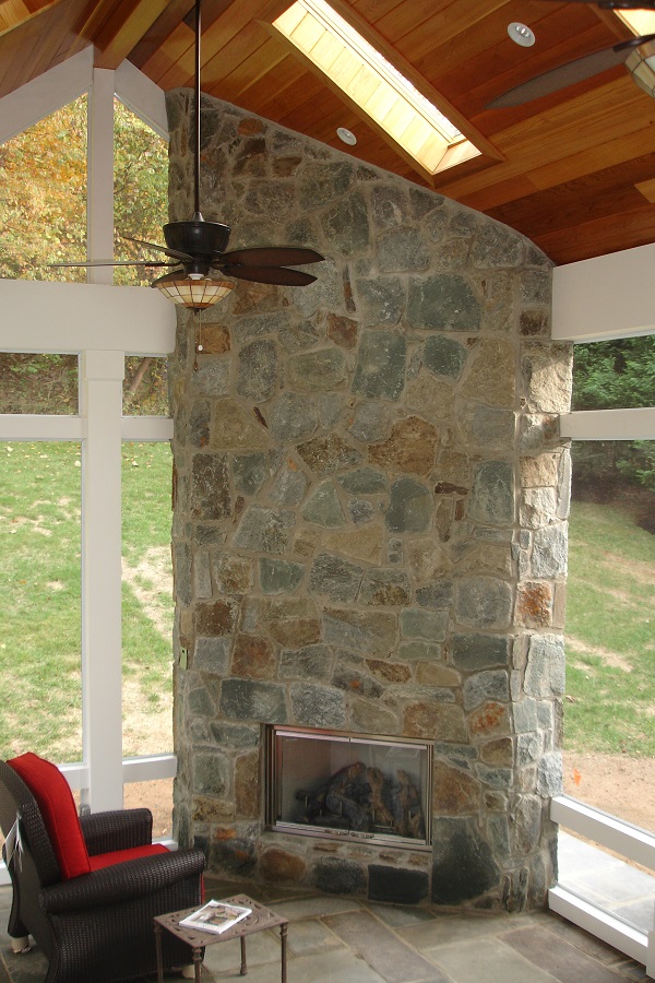 outdoor ground-level fireplace in screened porch, Potomac, Maryland