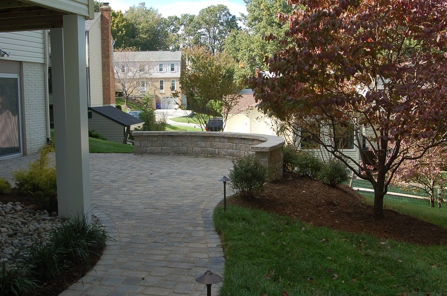 curved sitting wall builder in Potomac, MD with paver patio alternative photo