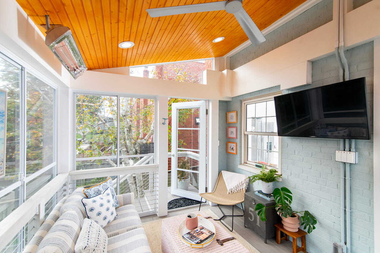 Modern Alexandria, VA screened porch featuring Sunspace windows, AZEK decking, and Infratech heaters by Design Builders. Modern Alexandria, VA screened porch featuring Sunspace windows, AZEK decking, and Infratech heaters by Design Builders.