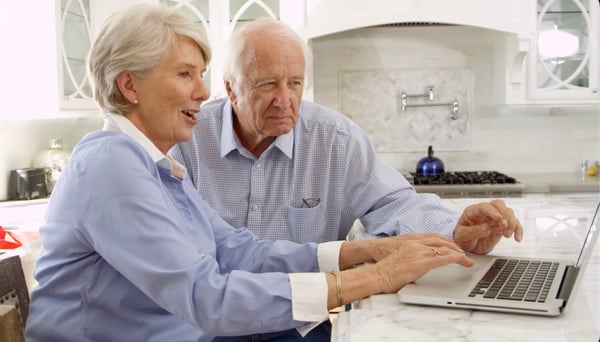 Older couple at computer