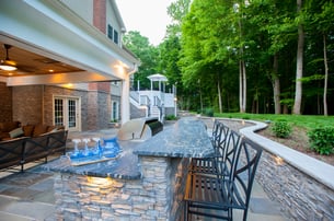 Eldorado_stone_outdoor_kitchen_with_Blaze_grill_trash_pull_outdoor_fridge_and_stainless_steel_outdoor_kitchen_cabinet_inserts_2