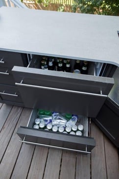 Danver outdoor kitchen design with built-in mini-fridge and cooling unit