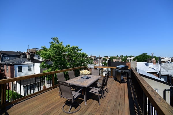 hardwood rooftop deck design 5 years after being built in Maryland