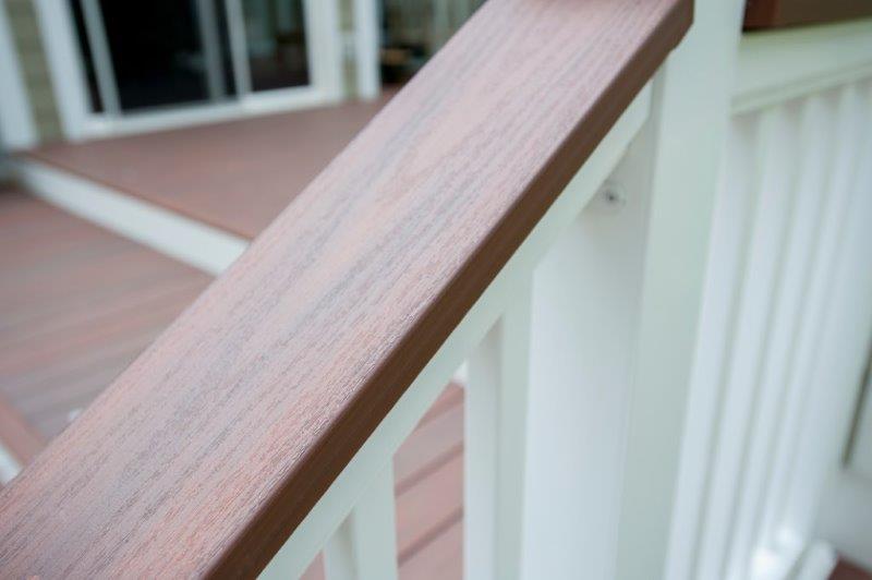 Wolf PVC decking handrail in rosewood trim