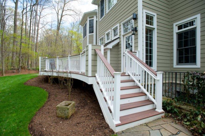 low-maintenance Wolf decking staircase, rosewood trim