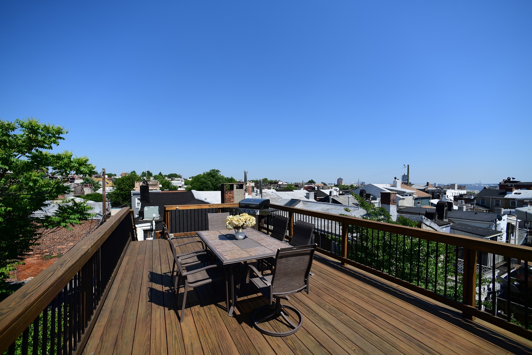 rooftop deck design with railings in baltimore, maryland on a clear day